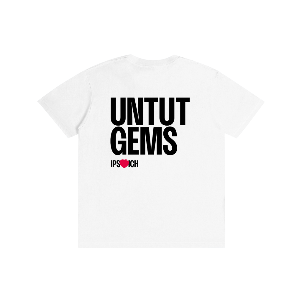 A white short-sleeve t-shirt with bold black text reading 'UNTUT GEMS' on the chest, and a smaller 'IPSWICH' logo below featuring a red heart, shown against a plain white background.